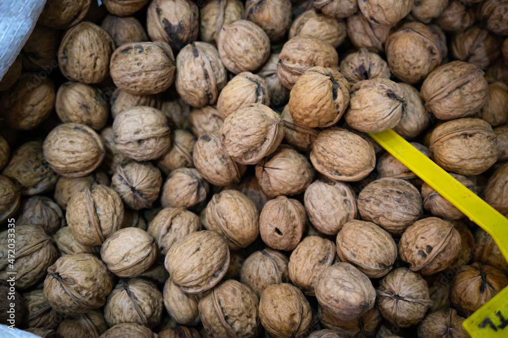 Dried walnuts in nutshells large quantities Dried walnuts in nutshells large quantities