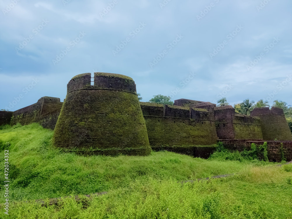 Ancient historical destination Bekal fort under the blue sky surrounded by greens. This fort made by the King Sivappa Naik located in Kasaragod ,Kerala