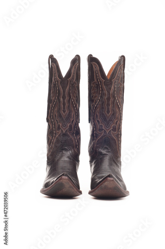Leather cowboy boots on white background