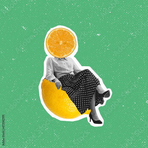 Contemporary art collage of woman with lemon slice head sitting on lemon isolated over green background