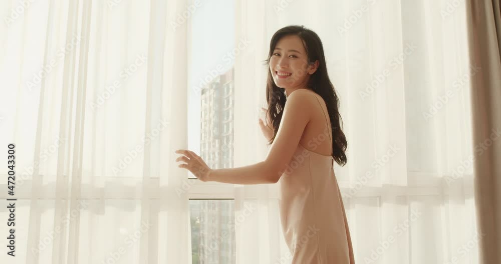 Happy young woman waking up in the morning,4K Happy young woman waking up in the morning,4K