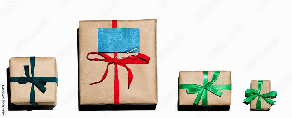 set of gift boxes isolated on white background with present card top view set of gift boxes isolated on white background with present card top view
