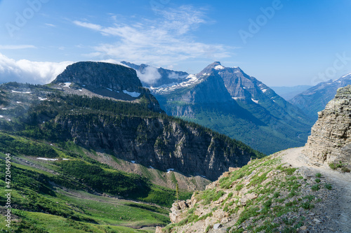 View of Mount Oberlin and Bearhat Mountain in Glacier National Park as viewed from hiking on the Highline Trail by the Going to the Sun Road on a sunny summer day