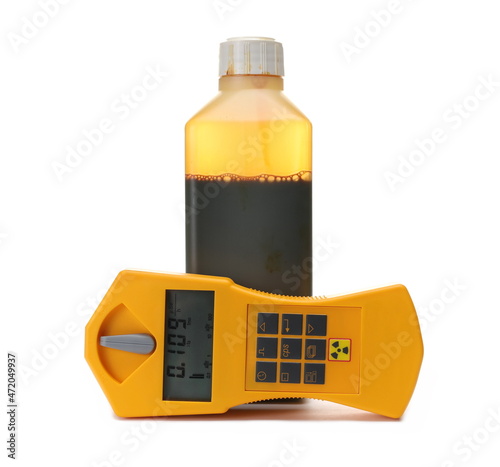 Geiger counter and povidone iodine HF 10% bottle isolated on white photo
