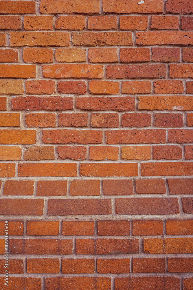 Traditional orange brick wall in Lodz, Poland Traditional orange brick wall in Lodz, Poland