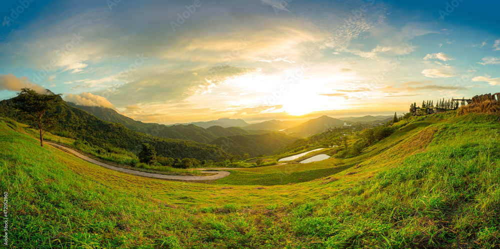 A panoramic view of the mountains and the beautiful sky,Panoramic view of colorful sunrise in mountains.