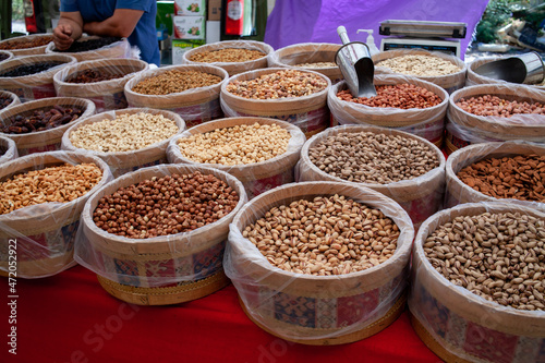 nuts on a oriental traditional bazaar in Turkey. Street market with dried nuts © Klemenso