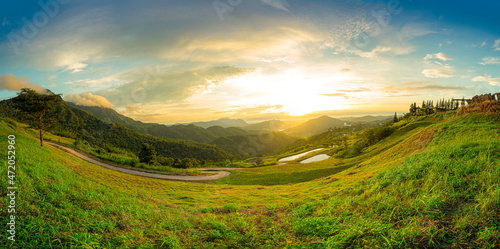 A panoramic view of the mountains and the beautiful sky,Panoramic view of colorful sunrise in mountains.