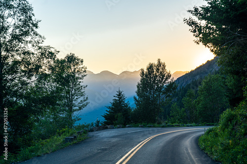 Golden hour, as viewed while driving on the Going to the Sun Road in Glacier National Park in Montana on a beautiful sunny summer evening