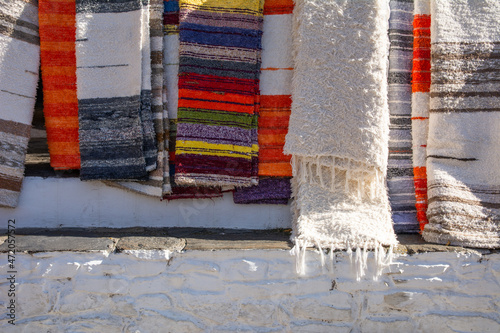 Colorful rugs known as Jarapa, sold in villages all over the Alpujarra region in the Sierra Nevada mountains of Andalucia, Spain. photo