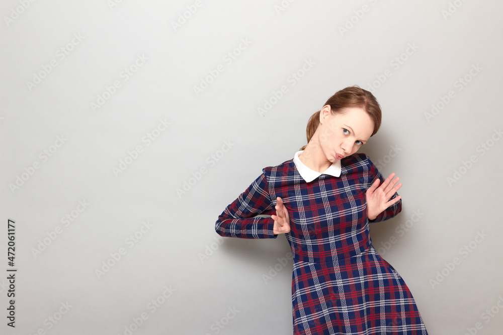 Shot of funny young blond woman making flirtatious grimaces and posing Shot of funny young blond woman making flirtatious grimaces and posing