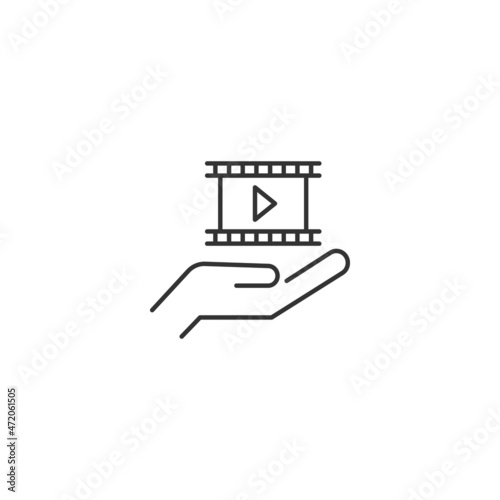 Giving and present concept. High quality editable strokes in flat style. Suitable for advertisig, web sites, online shopes, stores etc. Line icon of cine film over hand
