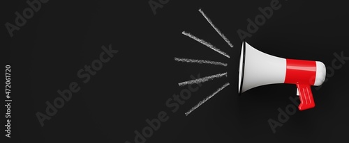 White and red megaphone or bullhorn with lines over black blackboard background, business announcement or communication concept, flat lay top view from above