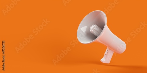 White megaphone or bullhorn floating over orange background, business announcement or communication concept with copy space