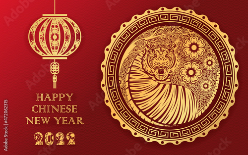 Chinese new year 2022, year of the tiger banner with gold tiger zodiac and gold flower and asian elements paper cut with craft style.