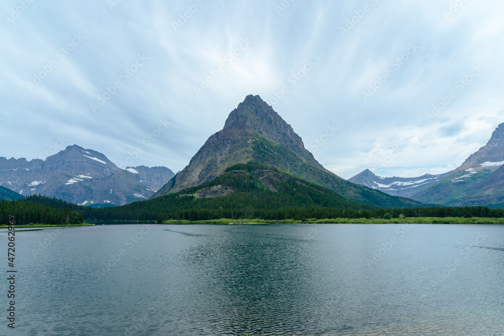 Swiftcurrent Lake at Many Glacier in Glacier National Park in Montana on a cloudy summer day