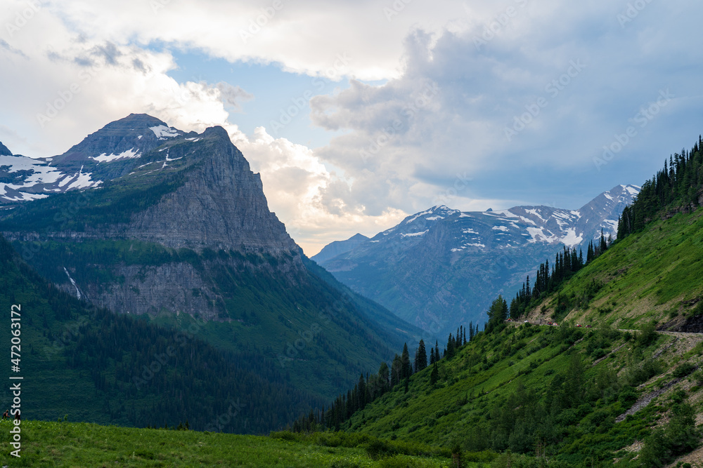 View from the Going to the Sun Road at sunset in Glacier National Park in Montana on a summer evening