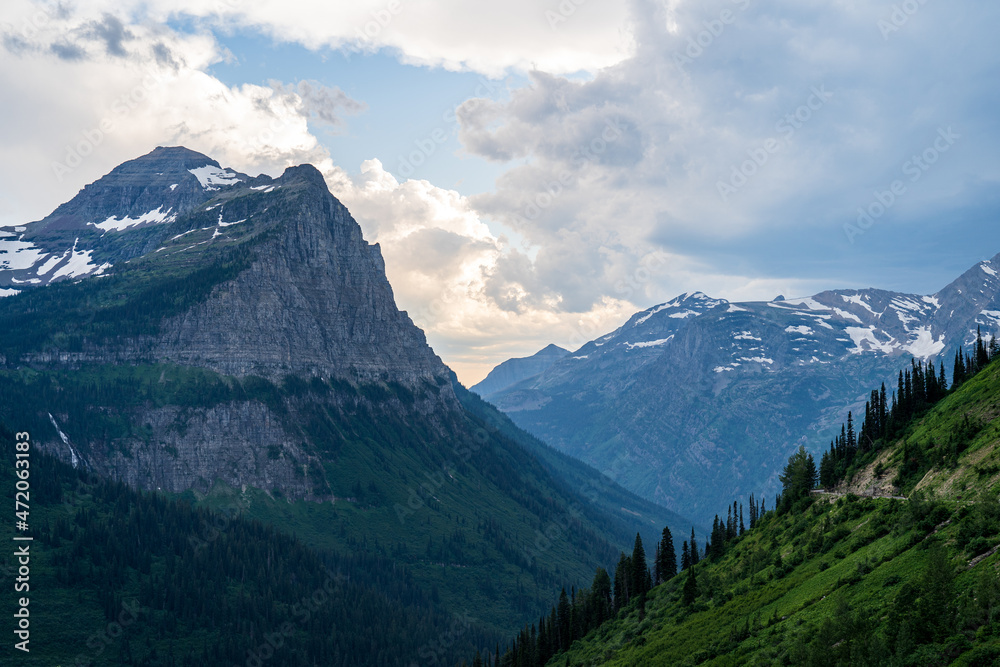 View from the Going to the Sun Road at sunset in Glacier National Park in Montana on a summer evening