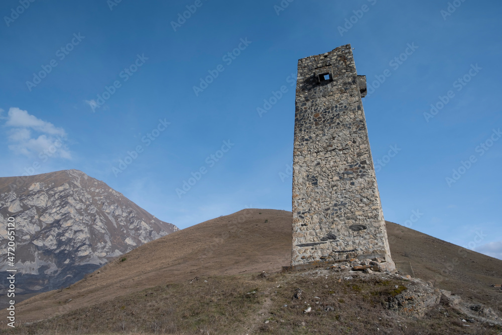 Watchtower of ancient dead city in mountains, Dargavs, Northern Ossetia, Russia Watchtower of ancient dead city in mountains, Dargavs, Northern Ossetia, Russia