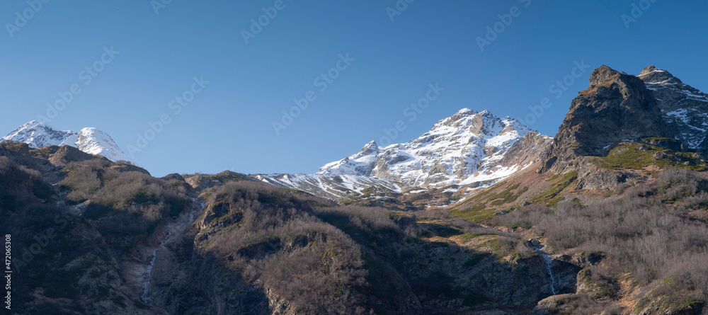 Scenic autumn mountain landscape with snow peaks, Tuymazinsky glacier, Digor Gorge, Northern Ossetia, Caucasus, Russia