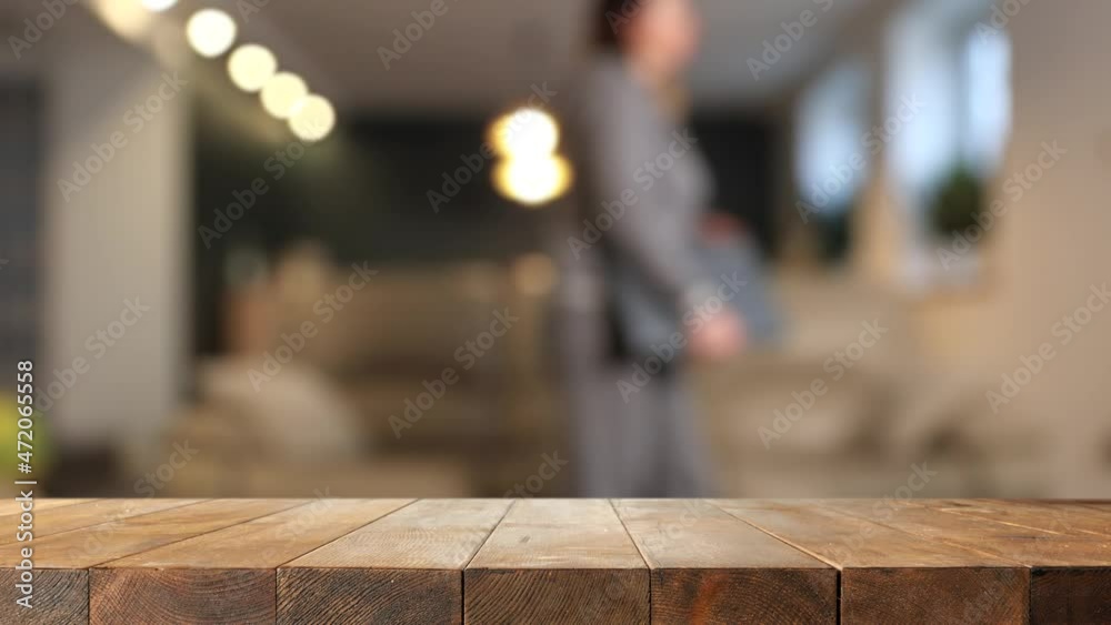 Desk of free space and home interior with woman on sofa Desk of free space and home interior with woman on sofa
