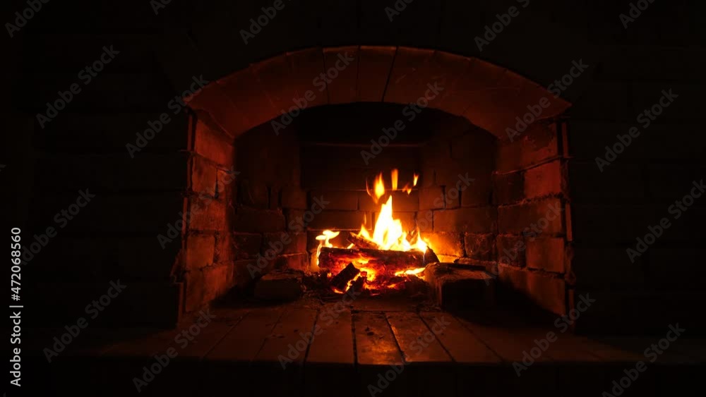 Hearth. Fire is Burning in the fireplace.  New Year's and Christmas. 