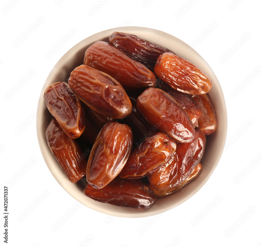 Sweet dried dates in bowl on white background, top view Sweet dried dates in bowl on white background, top view