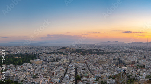 Evening sunset view from Lycabettus hill of the ancient Parthenon on Acropolis Hill in central Athens, Greece