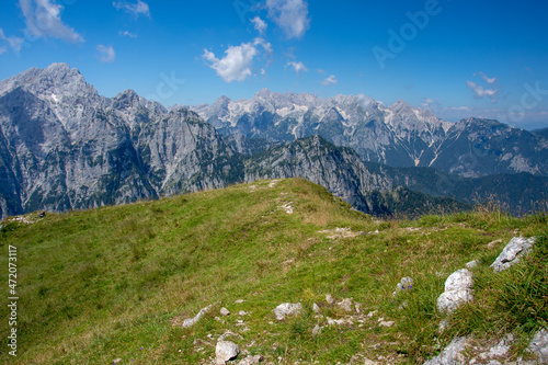 View from Debela Peč. Peak in the Julian Alps, Slovenia, august 2020. Horizontal, color photo. With view to hill Triglav.