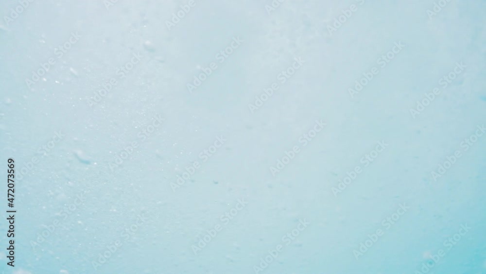 Wave rolls and breaks. Ocean wave rolls and breaks over the flat reef bottom in Maldives
