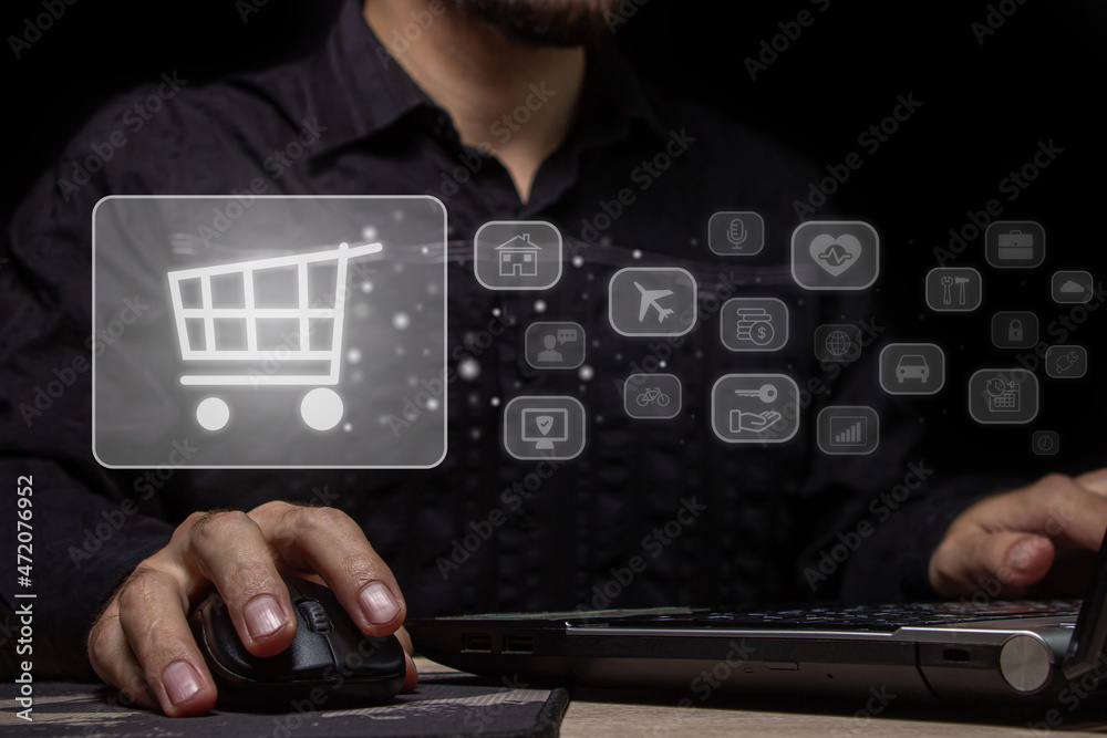 Digital shopping cart carrying out online shopping. The modern way of ...