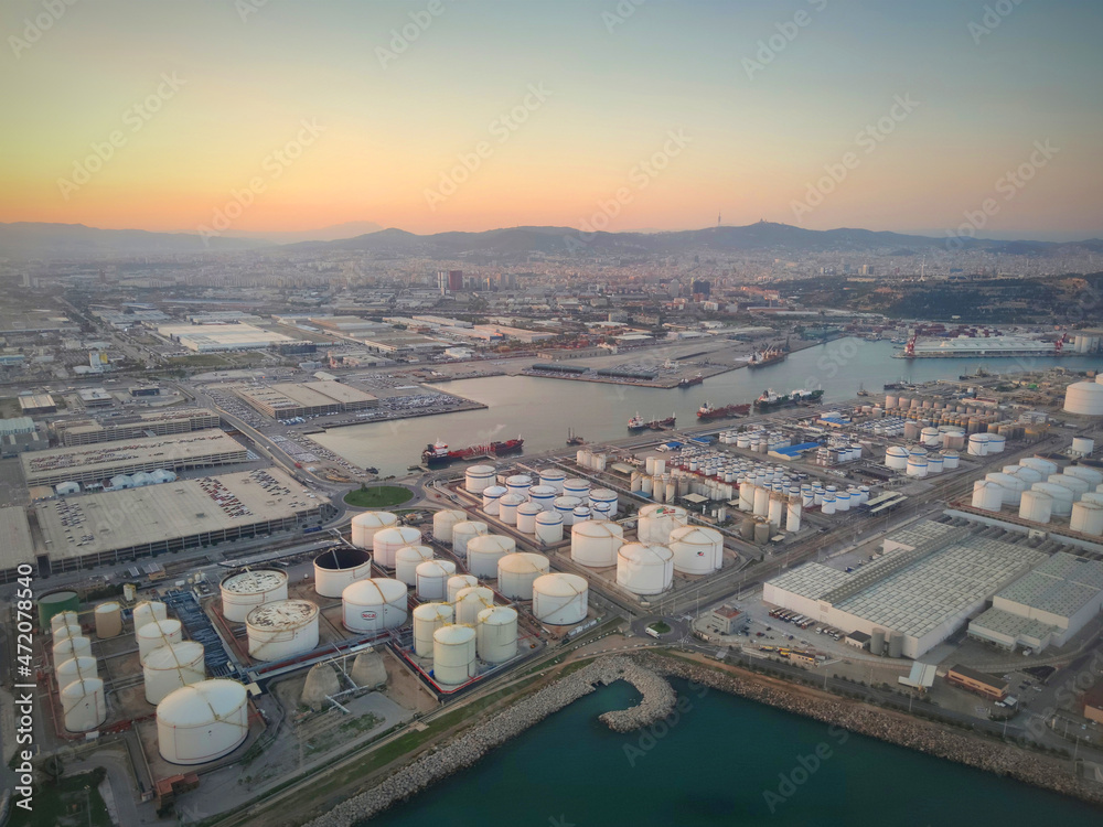 Barcelona industrial area and Harbor, Aerial view at sunset,Catalonia, Spain
