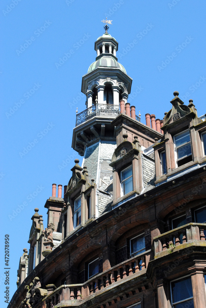Ornate Cupola on Old 19th Century Victorian Building against Blue Sky