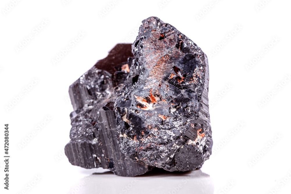macro mineral stone sherle, schorl, black tourmaline on white background macro mineral stone sherle, schorl, black tourmaline on white background