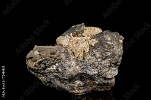 Macro stone Pyrite mineral with fluorite on a black background