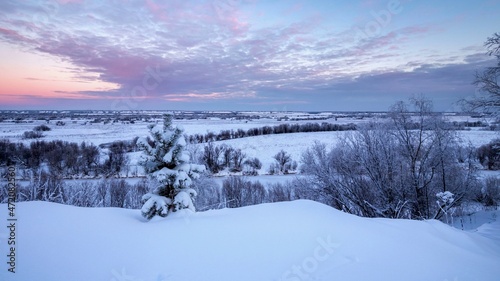 Sunrise over the snow-covered hillside. Winter landscapes © Aleksandr 44ARH
