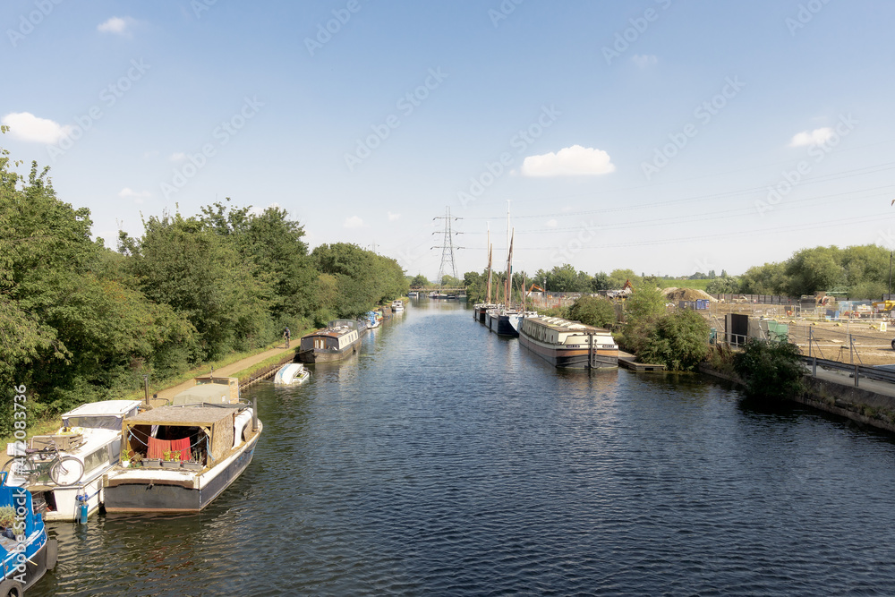 Naklejka premium Narrow boats on a London canal in Summer