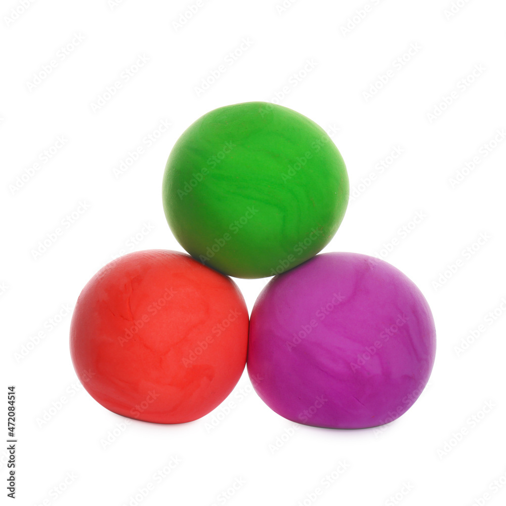 Different color play dough balls isolated on white Different color play dough balls isolated on white