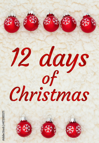 12 days of Christmas message with red snowflakes ornaments on beige sherpa photo