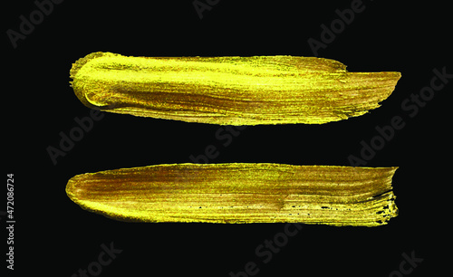 Golden brush stroke collection set on a black background or paintbrush	