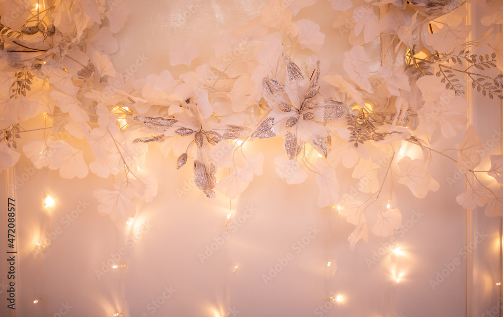 Fototapeta premium Christmas tree decorated with toys and a garland. New year background for your design. Seasonal holidays in winter
