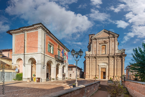 Moretta, Cuneo, Italy - the town hall and parish church of San Giovanni Battista (XVIII century) in Piazza Umberto I