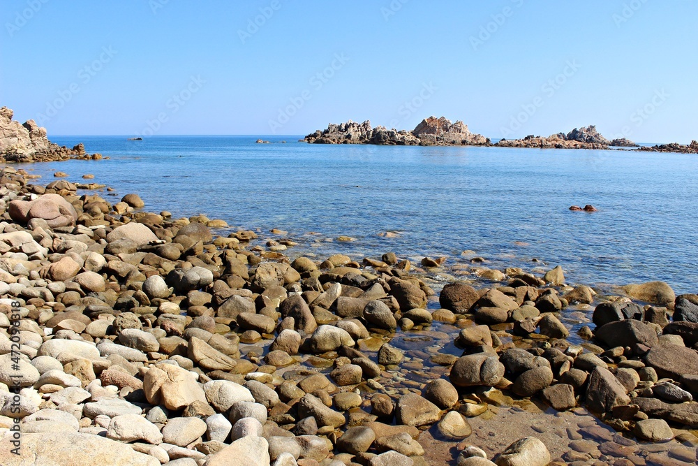 Italy, Sardinia Island: Foreshortening of Red Island ( Isola Rossa). Italy, Sardinia Island: Foreshortening of Red Island ( Isola Rossa).
