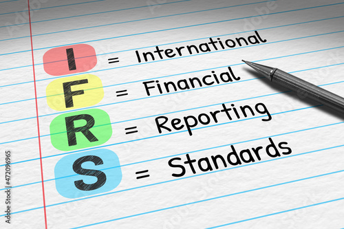 IFRS - International Financial Reporting Standards. Business acronym on note pad.