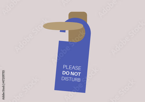 Do not disturb, the hotel tag hanging on a doorknob, holiday rest