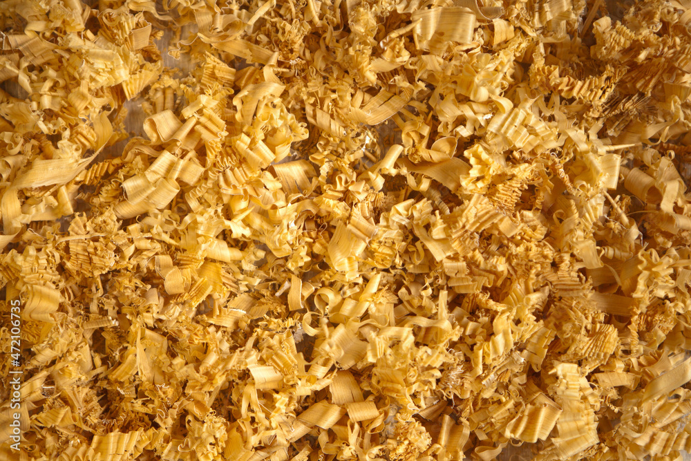 Wood Shavings for Animals. Timber shavings background pattern. Bedding for Horses