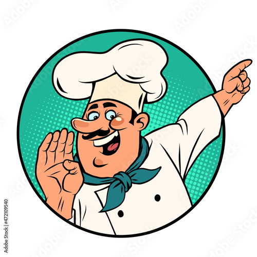 Man chef in a white cap. Smiling face. Professional points a finger Isolate on a white background