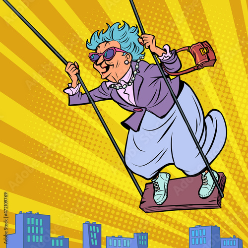 a old woman on a swing, laughing and having fun, flying over the city