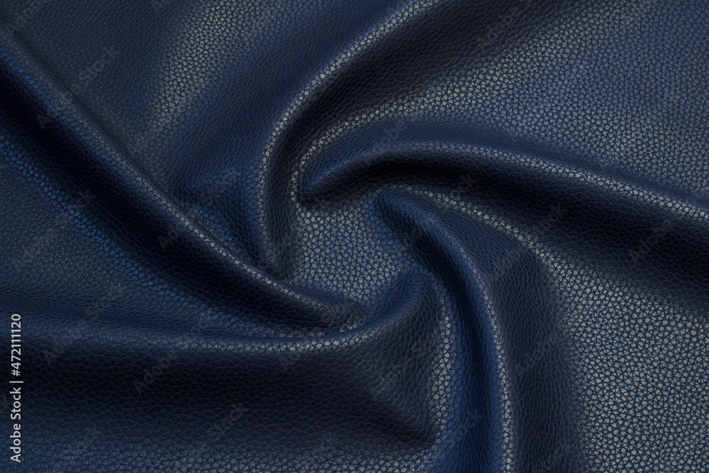 blue artificial leather with waves and folds on PVC base