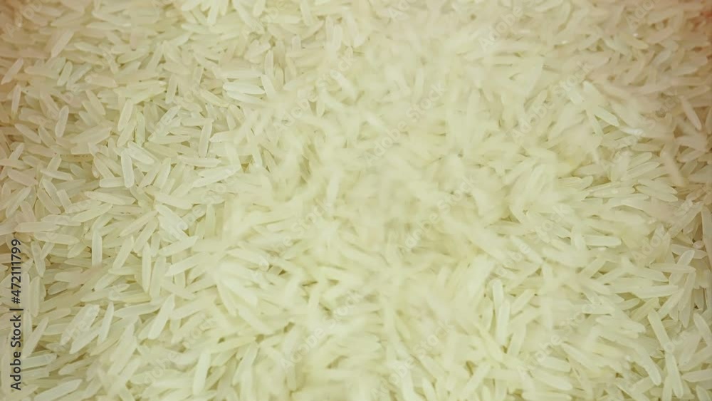 Close-up Raw Rice Food Background, Vegetarian Product For Healthy Eating. Close-up Raw Rice Food Background, Vegetarian Product For Healthy Eating.